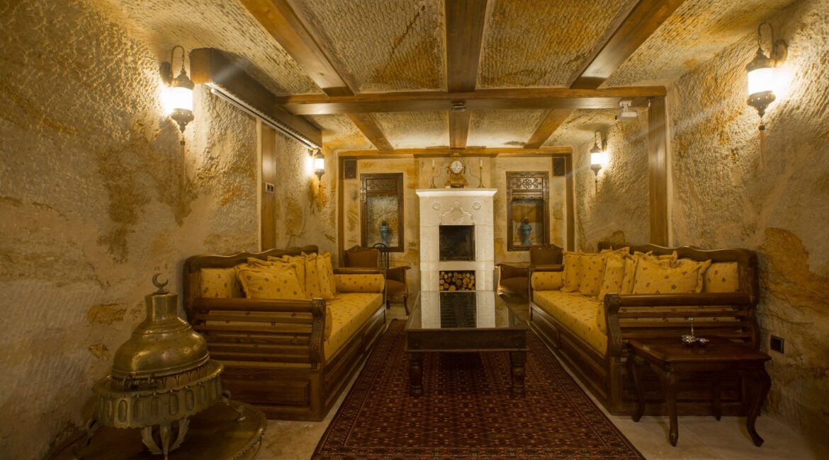 Entrance hall inside a restored cave suite at Kayakapı Premium Caves