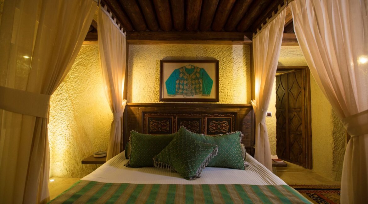 Romantic cave bedroom with luxurious furnishings at Kayakapı Premium Caves