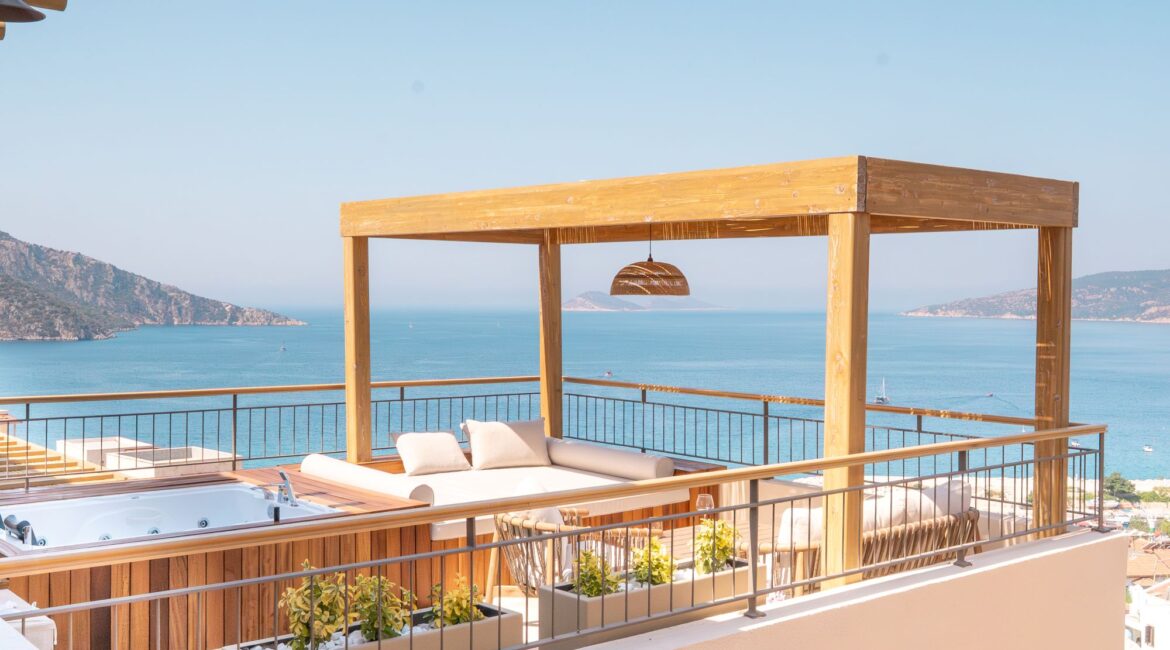 Outdoor jacuzzi and private sun terrace at Premium Room 8 Perivana, Casa Pery Hotel, Kalkan with panoramic views across Kalkan Bay.