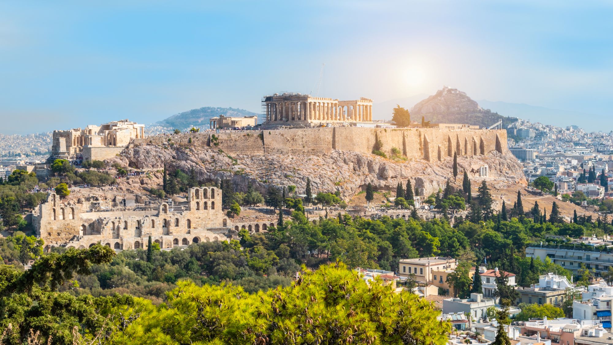Acropolis and Parthenon overlooking Athens city centre, Greece, viewed from a panoramic hillside viewpoint.
