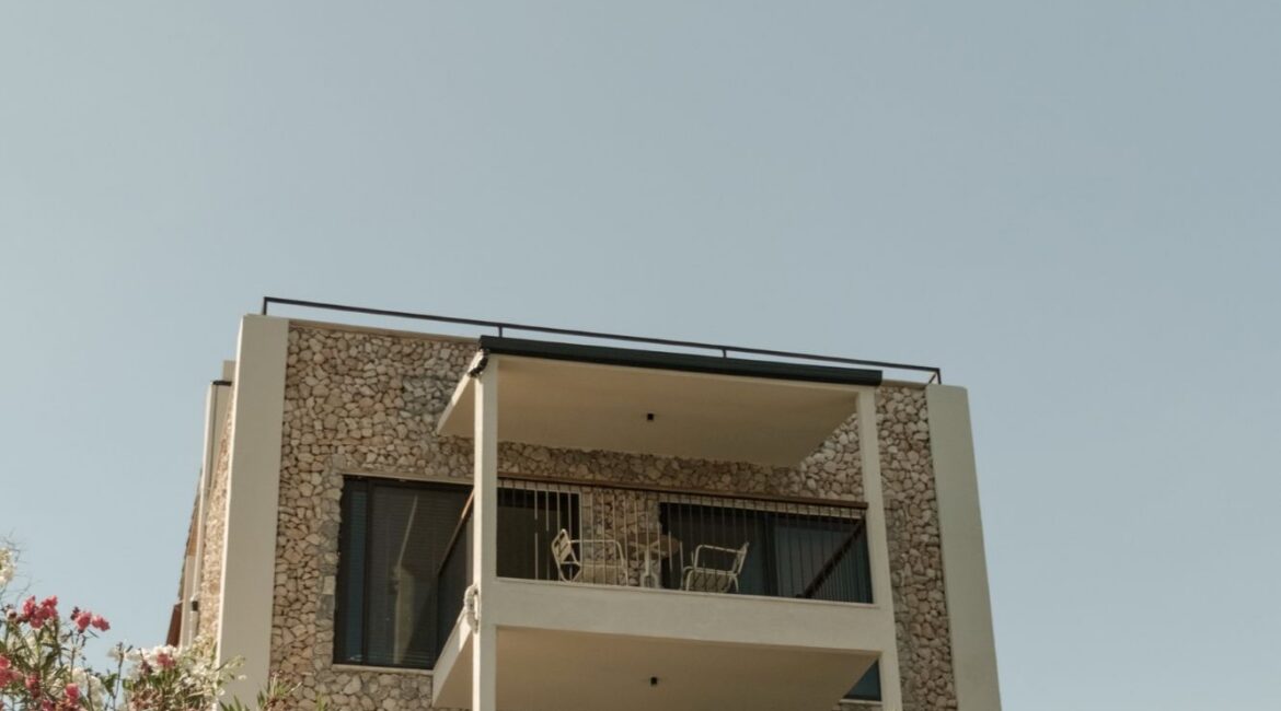 Exterior of Likya Gardens, an adults-only boutique hotel overlooking Kalkan on Turkey's Mediterranean coast.
