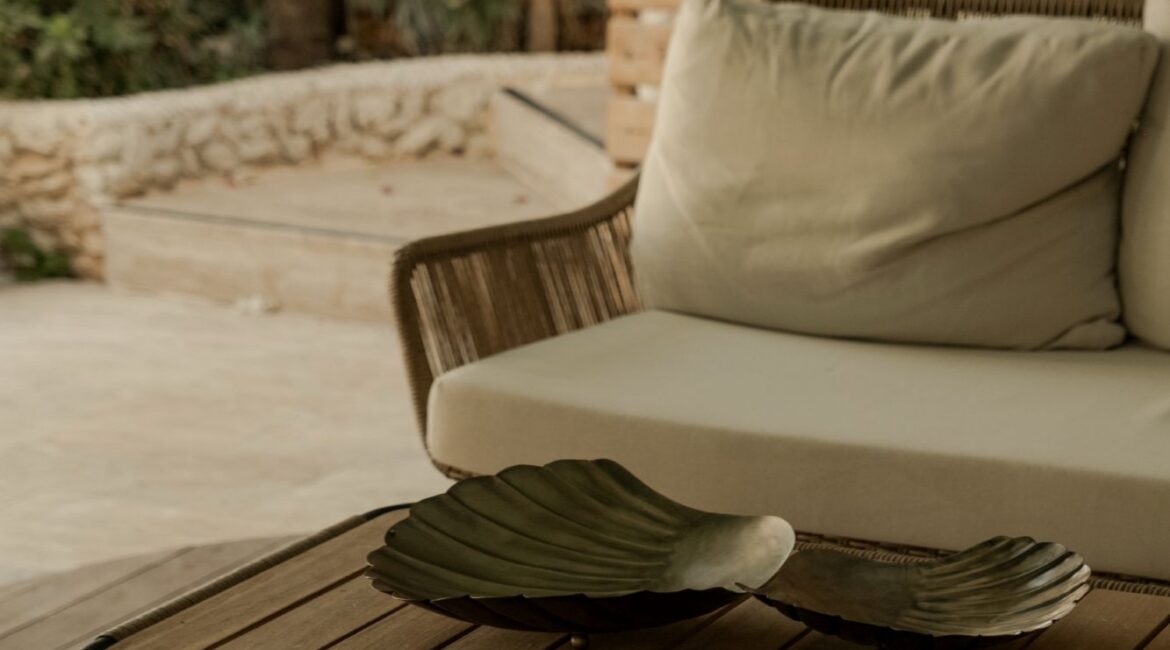 Peaceful reception terrace with comfortable seating at Likya Gardens boutique hotel in Kalkan, Turkey.