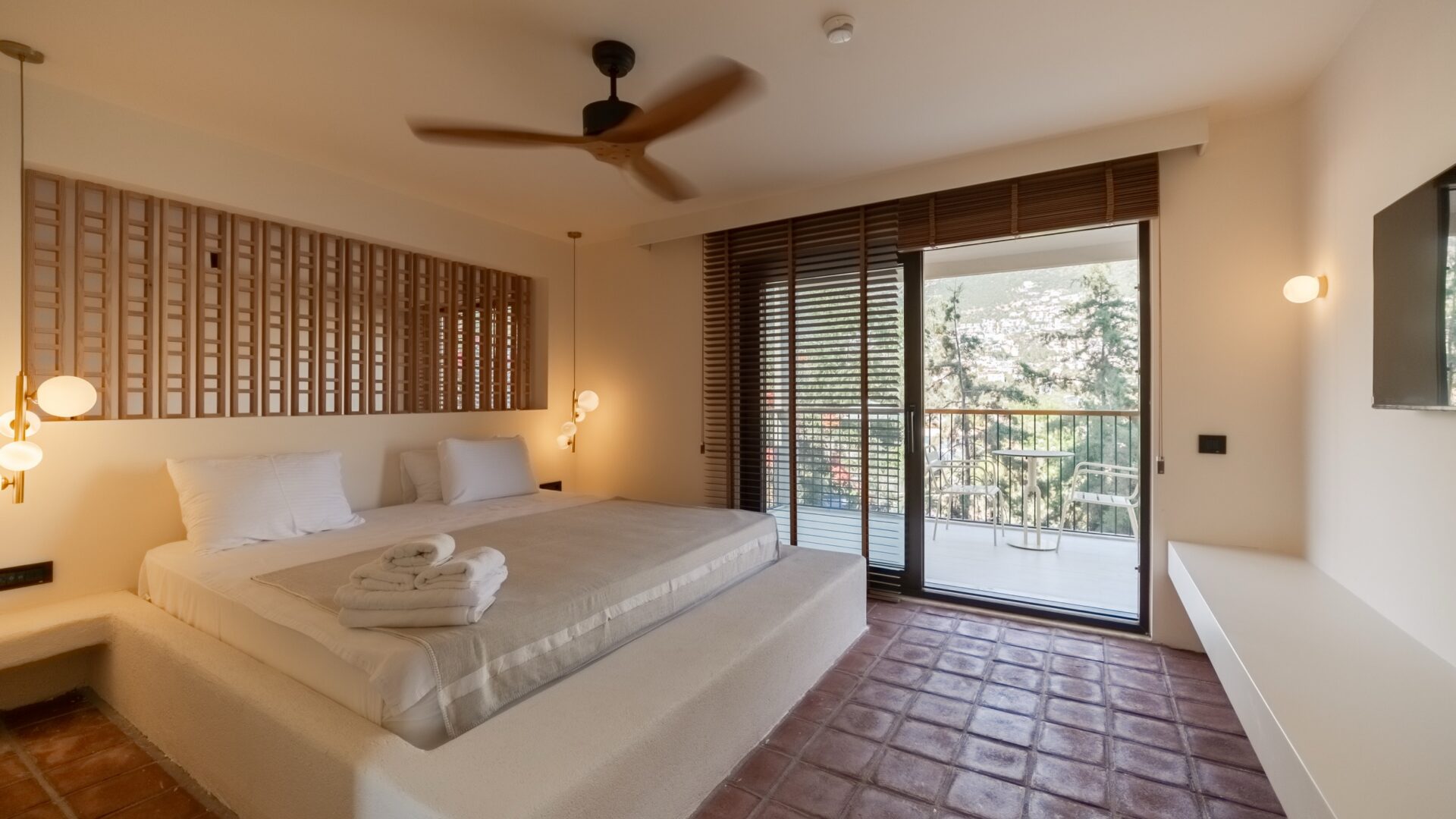 Bright Comfort Suite bedroom with balcony at Likya Gardens boutique hotel in Kalkan.