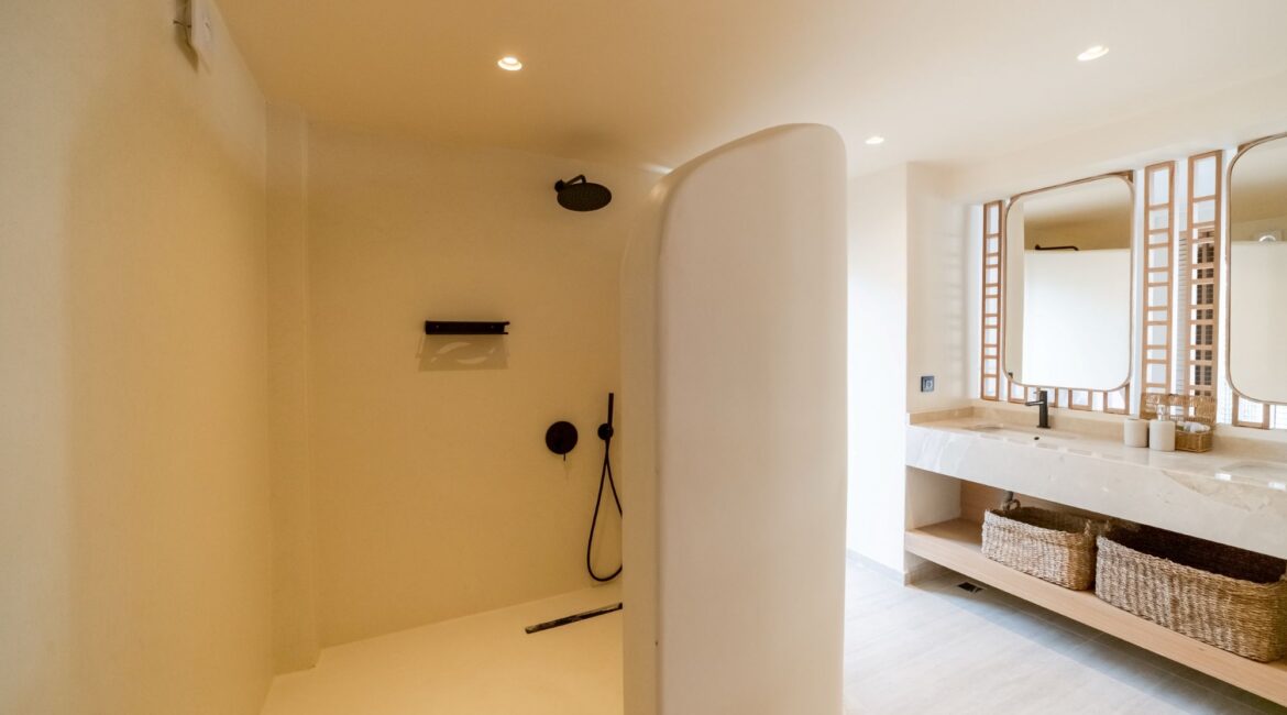 Walk-in shower in a Comfort Suite bathroom at Likya Gardens, Kalkan.