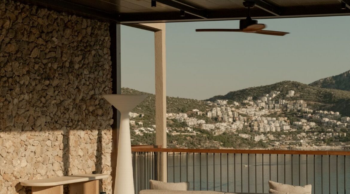 Elegant rooftop seating area overlooking Kalkan Bay at Asfiya Sea View boutique hotel.