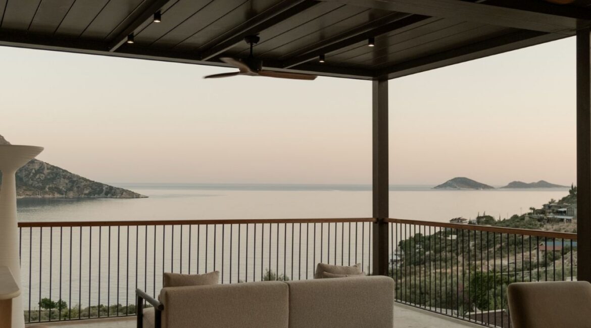 Comfortable rooftop sofas with panoramic sea views at Asfiya Sea View boutique hotel.