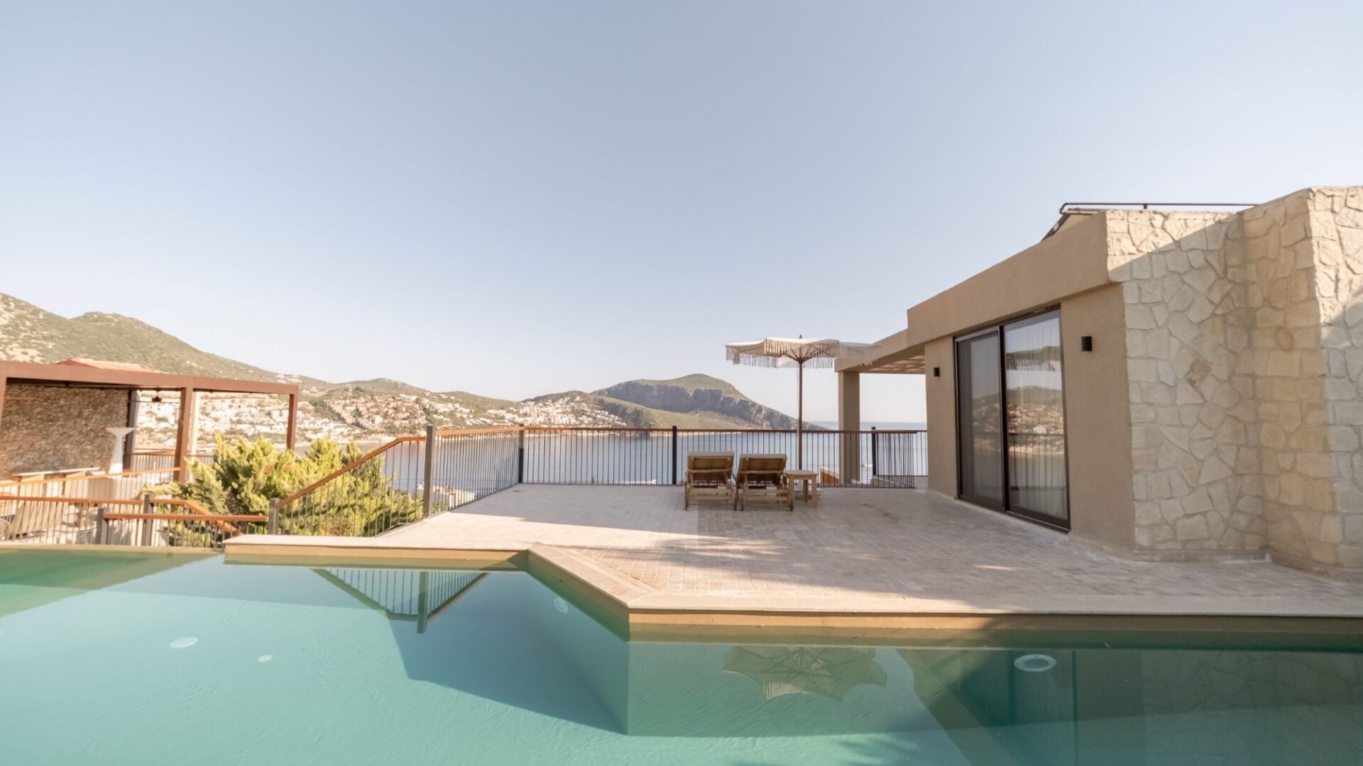 Private pool at Signature Pool Room 704 with uninterrupted views across Kalkan Bay at Asfiya Sea View