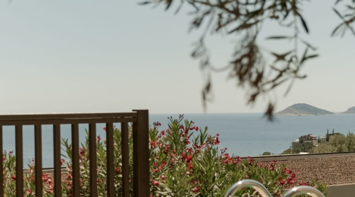 Private pool terrace surrounded by Mediterranean gardens at Asfiya Sea View in Kalkan, Turkey.