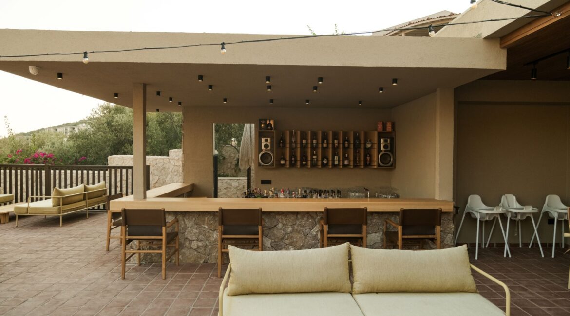 Open-air bar and poolside seating at Asfiya Sea View Hotel in Kalkan